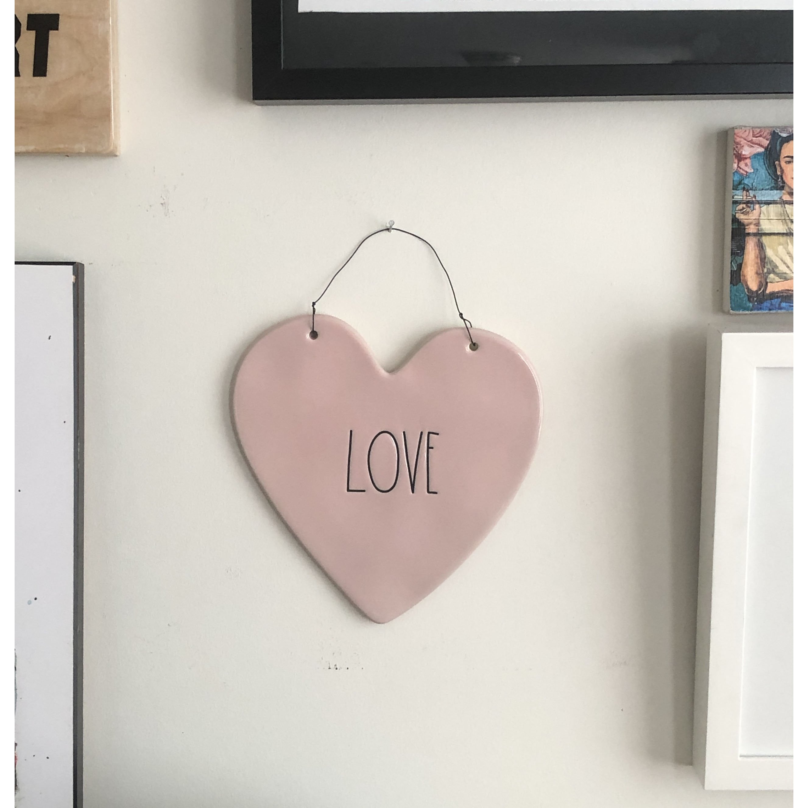 Rae Dunn Heart Shaped Ceramic Wall Hanging in Pink with Love In Black Font