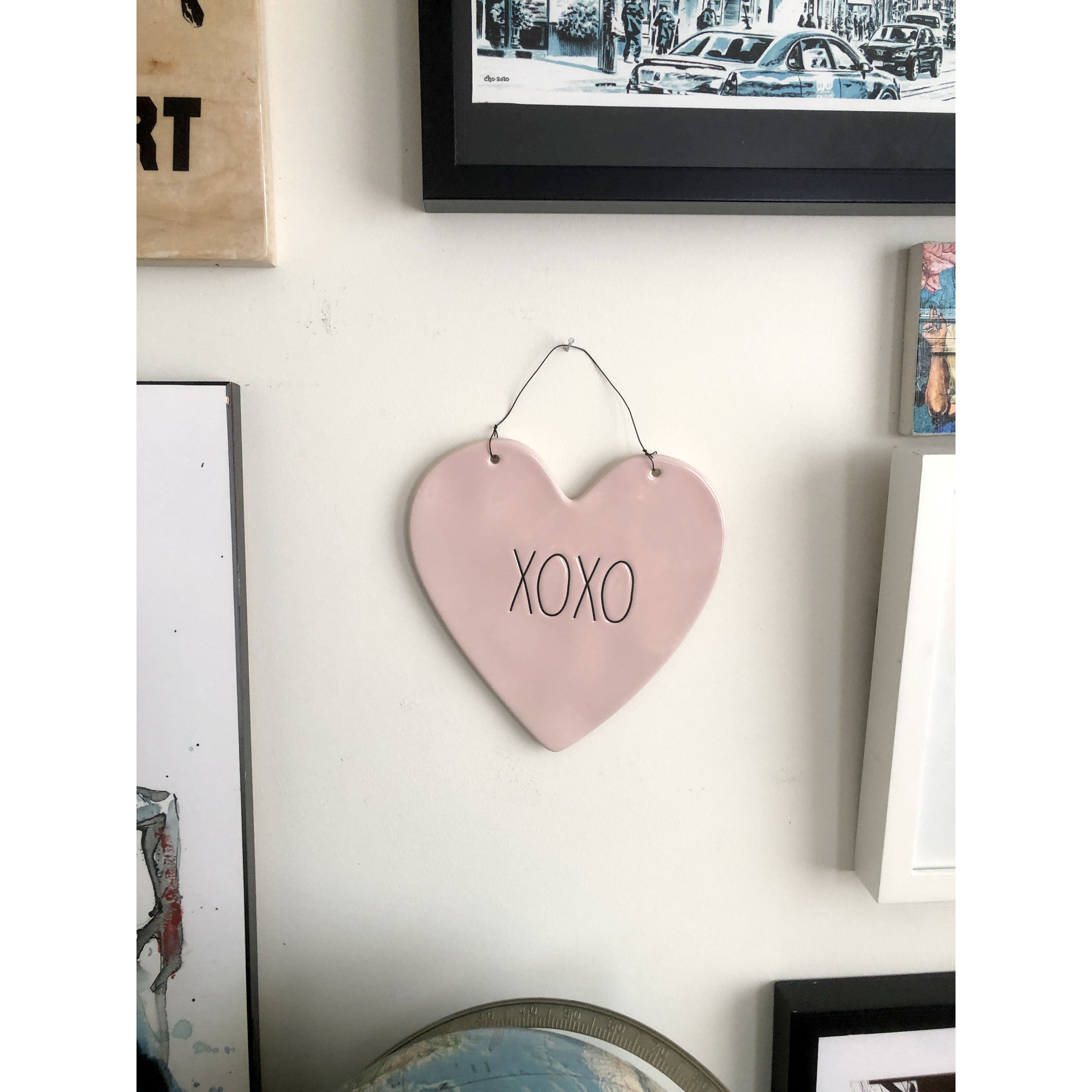 Rae Dunn Heart Shaped Ceramic Wall Hanging in Pink with XOXO In Black Font